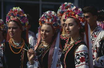 RUSSIA, Festivals, Ukranian Folk Dancers wearing floral head dresses