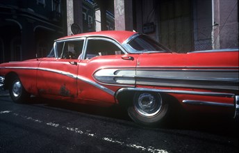 CUBA, Pinar Del Rio, Transport, Old red 1950 s US car