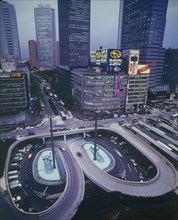JAPAN, Honshu, Tokyo, Shinjuku with aerial view onto road intersection at night with skyscrapers