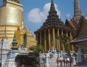 THAILAND, Bangkok, Wat Phra Keaw temple complex buildings with tourists