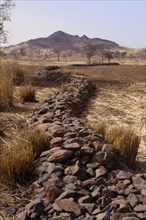 BURKINA FASO, Environment, Flooding, "Bund, low rock walls built to prevent soil erosion by flash