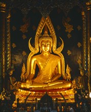 THAILAND, Bangkok, "Marble Temple, interior, golden buddha statue, gold, black b'gnd "