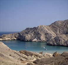 OMAN, Capital Area, Bander Jissah, "Gulf of Oman. View from coastline over bay with yachts and a