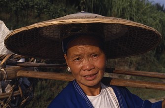 CHINA, Guizhou , Chong An, Portrait of a local woman wearing a traditional hat