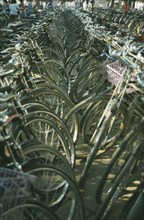 CHINA, Suzhou, Bicycle Park with view along rows of bicycles