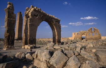 TURKEY, Harran  , Ulu Camii, General view of ruined archway and building