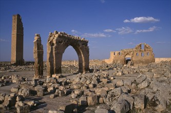 TURKEY, Harran  , Ulu Camii, "General view of ruined archway, tower and building"