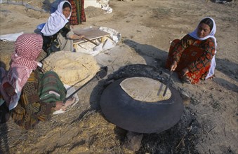 TURKEY, Central Anatolia, Nomads cooking Yufka or Turkish chapatti