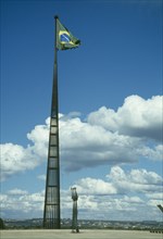 BRAZIL, Federal District, Brasilia, Praca dos Tres Poderes Tall spire with flag flying at the top