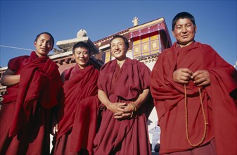 CHINA, Tibet, Lhasa, Pilgrim monks to Jokhang Temple