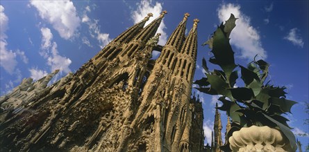 SPAIN, Catalonia , Barcelona , Angled view of the facade of La Sagrada Familia by Gaudi with no