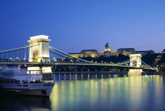 HUNGARY, Budapest , View across the River Danube and Chain Bridge at night.
