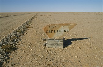 NAMIBIA, Tropic of Capricorn, Sign next to the desert road