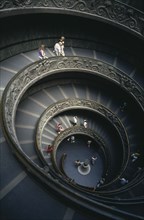 ITALY, Rome  , Vatican City, The spiral staircase in the Vatican Museum with tourists descending