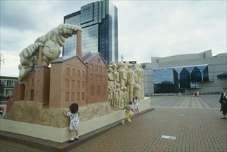 VISUAL ARTS, Sculpture, Children climb on large modern sculpture at a Birmingham Convention Centre
