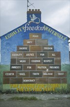 IRELAND,  North , Belfast, "Peace mural depicting building blocks The Foundation Stones for lasting
