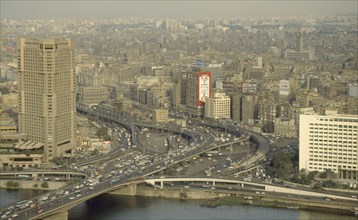 EGYPT, Cairo, Aerial view over busy roads and city architecture near the Nile