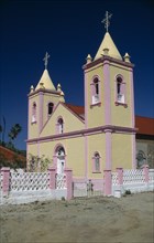 MEXICO, Baja California Sur, El Triunfo , Yellow and pink painted church