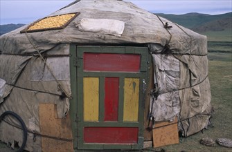 MONGOLIA, Overhangai , Dried cheese on roof of a yurt / ger . Genral view.