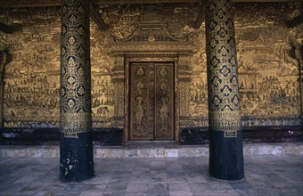 LAOS, Luang Prabang, Wat Mai Suwamaphumaham. Ornate gold doorway