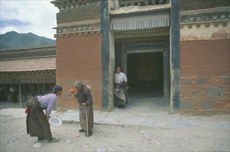 CHINA, Gansu,  Xiahe, Labrang Monastery.  Three women pilgrims