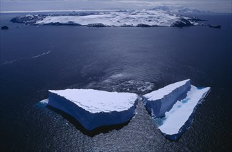 ANTARCTICA , Deception Island,  Aerial view of icebergs off  the island