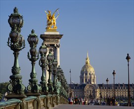 FRANCE, Ile de France, Paris, Hotel d’ Invalides partly seen from across Pont Alexandre III.