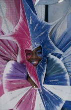 ENGLAND, London, Detail of Notting Hill carnival dancers costume and mask
