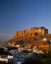 INDIA, Rajasthan, Jodhpur, Meherangarh Fort on the hilltop overlooking the town in the afternoon