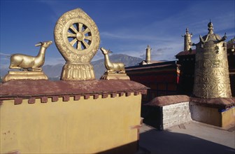 CHINA, Tibet, Lhasa , Jokhang Temple roof with gold statues