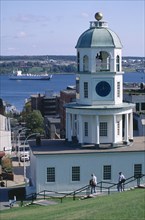 CANADA, Nova Scotia, Halifax, View from hill toward Watch Tower overlooking harbour with sailing
