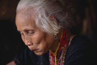 THAILAND, North, Chiang Rai, Close up of an elderly Karen refugee woman