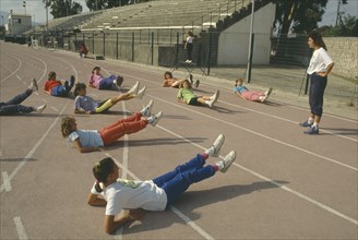GREECE, Education, Exercise, Children exercising on School track