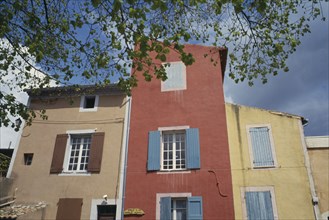 FRANCE, Languedoc Rousillon, Colourful building with shutters