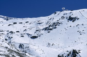 SPAIN, Andalucia, Sierra Nevada, Ski resort in snow.