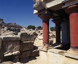 GREECE, Crete, Iraklion, "Knossos, ruins of the former Minoan capital, red columns in foreground "