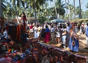 INDIA, Goa , Anjuna, "Flea market, stalls selling tourist souvenirs"