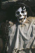 PERU, Ica Administrative Division, Nazca, Mummified body in a Nazca cemetery.