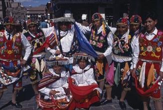 PERU, Cusco Department, Cusco, Group in traditional costume at Inti Raymi.