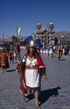 PERU, Cusco Department, Cusco, Male figure in traditional costume at Inti Raymi.