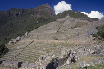 PERU, Cusco Department, Machu  Picchu, View across the ruins towards the mountains behind.