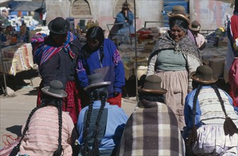 PERU, Cusco Department , Pisac, Group of women in Pisco market place.