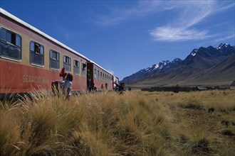 PERU, Puno Administrative Depatment, La Raya, Train stopped on the altiplano at the highest pass on