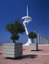 SPAIN, Catalonia, Barcelona, "Olympic stadium.  The Torre Calatrava, trees planted in stone tubs on