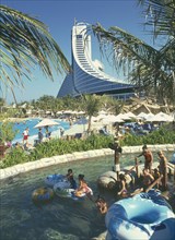 UNITED ARAB EMIRATES, Dubai, "View over Wild Wadi water park pools, people in the water with