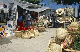 WEST INDIES, Jamaica, Ocho Rios, Tourist goods for sale in market.