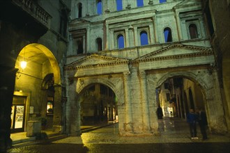 ITALY, Veneto, Verona, "Porta Borsari, Roman gateway at night."