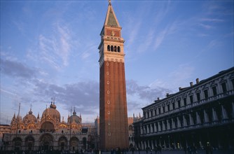 ITALY, Veneto, Venice, The Piazza San Marco with the Campanile bell tower in the foreground and the