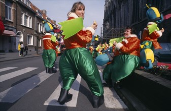 BELGIUM, Brabant, Brussels, "Woluwe St. Lambert, Spring Festival.  Group of people in green and