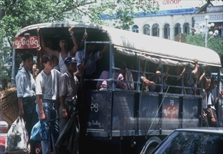 MYANMAR, Yangon, Crowded public bus.